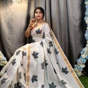Elegant Kerala Cotton Hand-Painted White Saree with Charcoal Leaf Motifs & Gold Border – Free Size with Blouse Piece