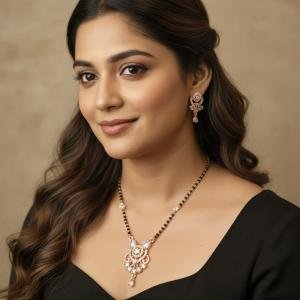 rose gold-plated American diamond studded Mangal sutra with matching earrings.