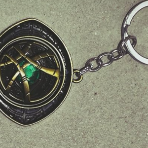 Doctor-Strange Eye of Agamotto Infinity Stone Keychain, Metal Pendant with Green Crystal, Black and Gold