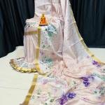 Handcrafted Cream Modal Silk Saree with Multicolor Floral Prints, Gold-Peach Borders & Blouse Piece