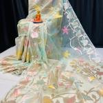 Ivory Bloom – Handcrafted Pure Muslin Saree with Gold Border & Multicolor Floral Motifs