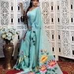 Hand-Painted Baby Pink Mul Cotton Saree with Multicolor Floral Artwork