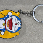 Doraemon Cartoon Character Metal Keychain, Blue and Yellow Enamel Design