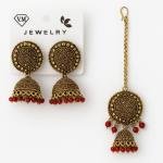 gold-plated oxidized jhumka earrings and maang tikka set
