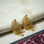 gold stud earrings with filigree and rava work