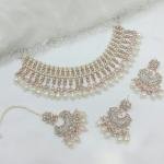 Rose Gold Finish Necklace Set With Stone And Pearl Work