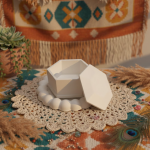 Handmade gypsum décor piece with a smooth matte finish