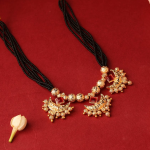 Traditional Gold-Plated Mangalsutra Necklace Featuring Black Beads And Red Stone Embellishments