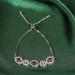 Adjustable Silver-Toned Bolo Bracelet with Oval-Cut Red Garnet or Imitation Stones